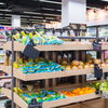 Shelves of produce in a grocery store.