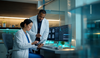 Healthcare workers reviewing medical imaging