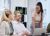 four coworkers conversing