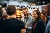 Close up picture of participant group at trade show exhibition event