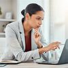 Women focusing on laptop