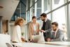 Group of working adults having discussion 