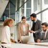 Group of working adults having discussion 
