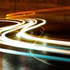 Long exposure of cars driving on a road.