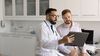 Healthcare professionals having a meeting with a tablet