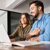 colleague-discussion-on-laptop