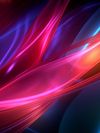 Abstract image of glowing, silk-like ribbons flowing in vibrant colors, including purple, pink, orange and blue on a dark background.