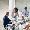 Business people and manager with laptop on desk for financial meeting, pitch or presentation.