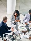 Business people and manager with laptop on desk for financial meeting, pitch or presentation.