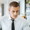 A businessperson reads why Hyland was named a leader in the IDC MarketScape for Cloud Content Services.