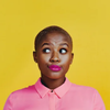 Person in pink button-down shirt shrugs, with bright yellow background.