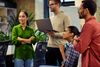 Office team members in standup meeting
