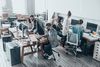 Technology professionals in modern office environment