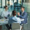 Group of employee workers in business meeting, team planning or collaboration at the workplace