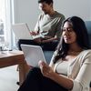 two people working on their laptop and tablet